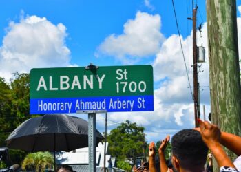 Ahmaud Arbery, Wanda Cooper-Jones, Marcus Arbery Sr., father, Brunswick, Georgia, street sign, honor, parents